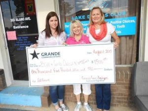 Lisa Tyler with Grande; J.B. (Babs) Troutman, BGCNCT president & chief professional officer; and Lori Salisbury (Photo Credit: Grande Communications).