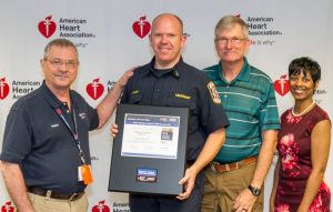 Pictured (from left): Dr. Ray Fowler, Co-Chair Mission: Lifeline North Texas; Argyle Fire Lieutenant Cody Miller; former Chief Jerry Kirby; Takiyah Wilson, Mission: Lifeline Director North Texas. (Photo courtesy of American Heart Association)