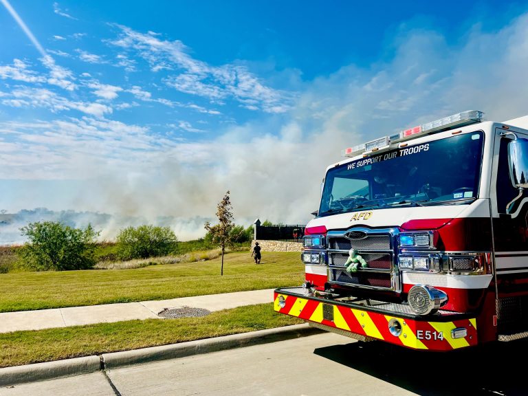 Major delays on I-35W caused by grass fire